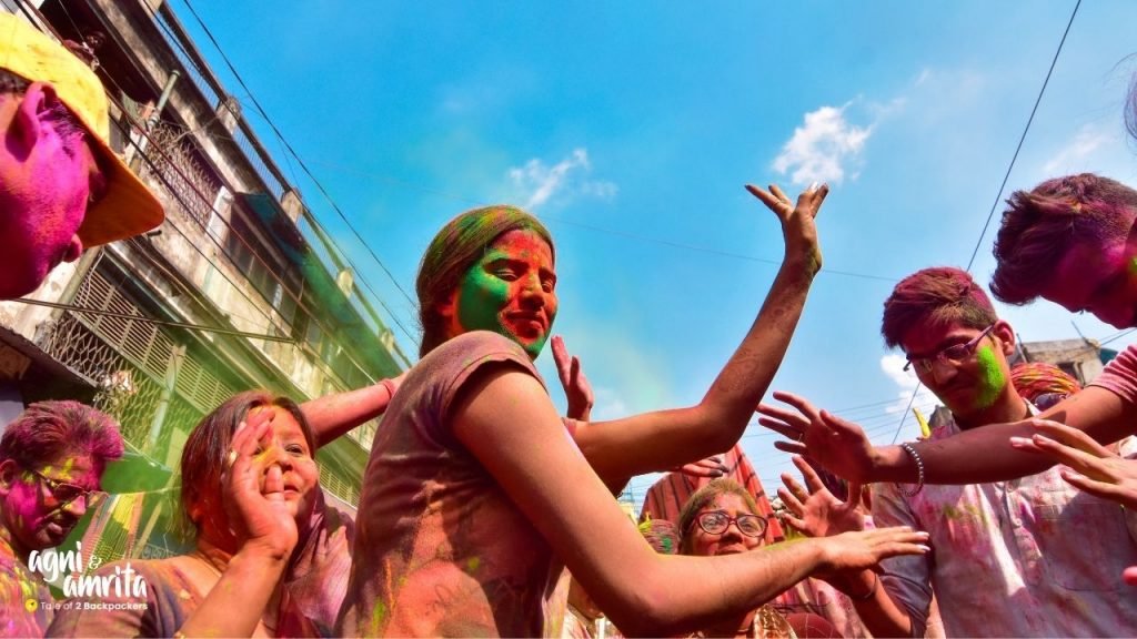 Girls dancing during Holi