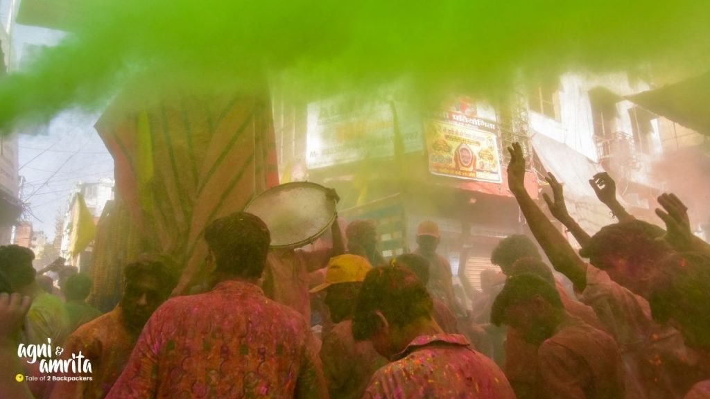 People playing drums during Holi procession in Kolkata