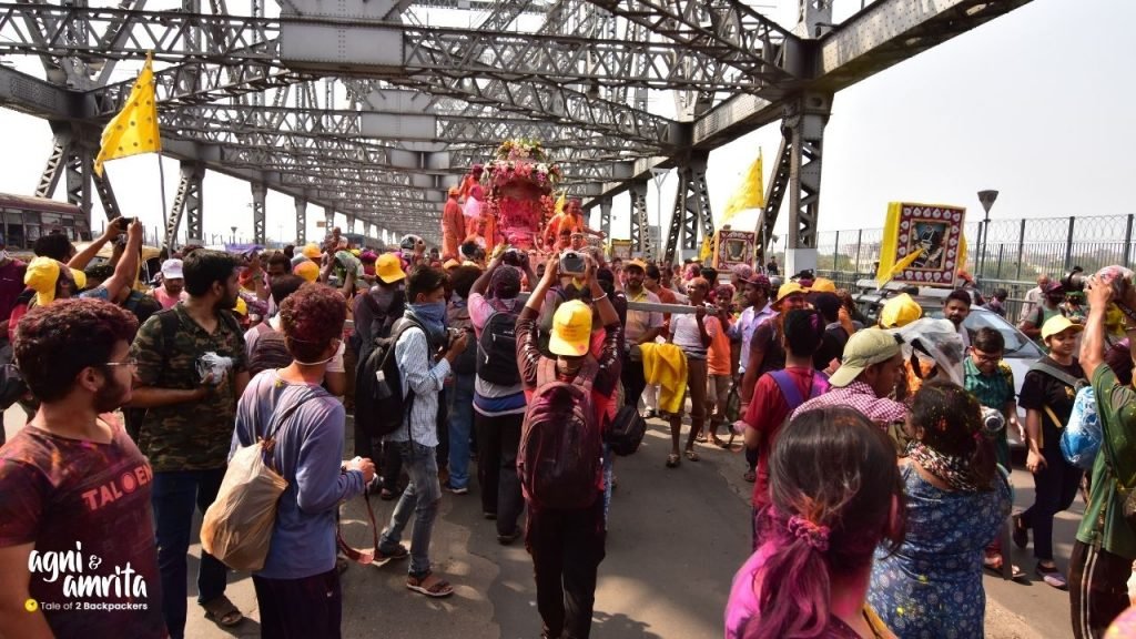 Rolls Royce Holi Procession crossing the Howrah Bridge Kolkata